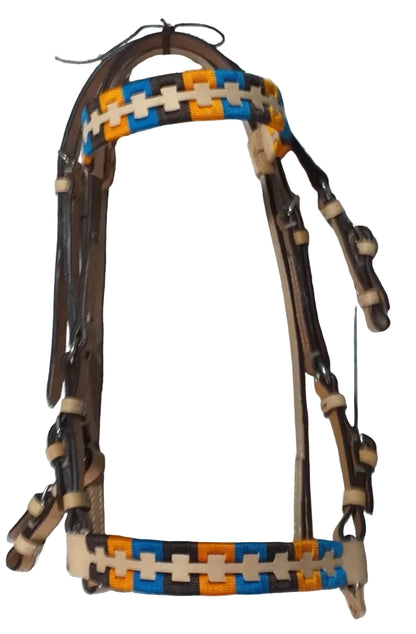 Brown horse bridle with colorful pattern on a light gray tiled background
