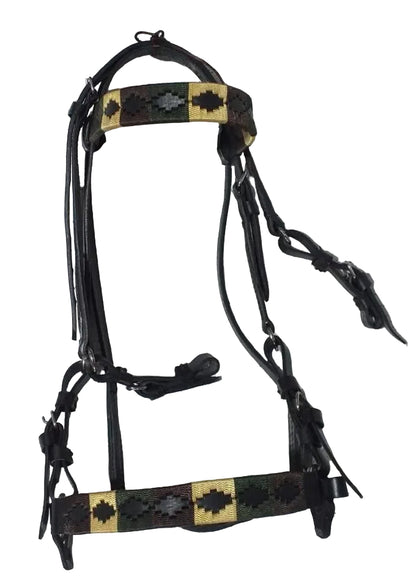 Horse bridle with decorative leather straps on a tiled floor