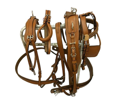 Set of brown leather horse bridle and reins on a white surface